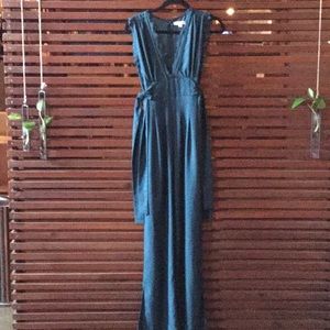 Floor length pants romper with lace accent.